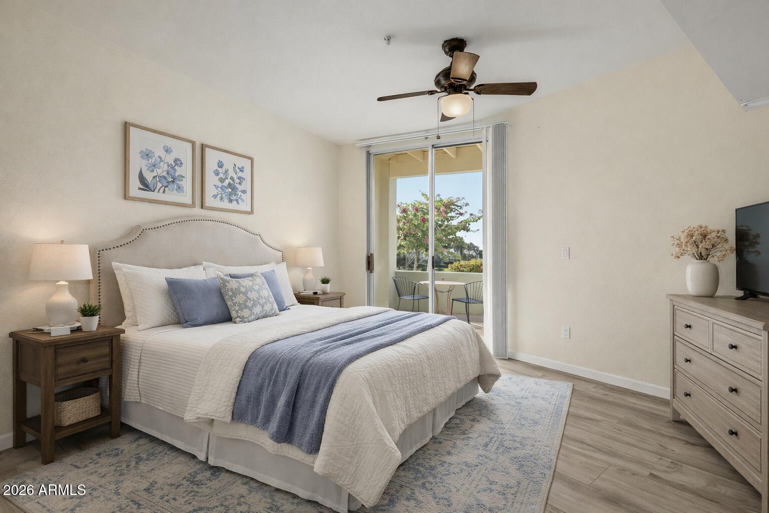 1825 West Ray Road, Unit 1018 Chandler, AZ 85224 - Photo 11 of 46 a bedroom with a bed and a window