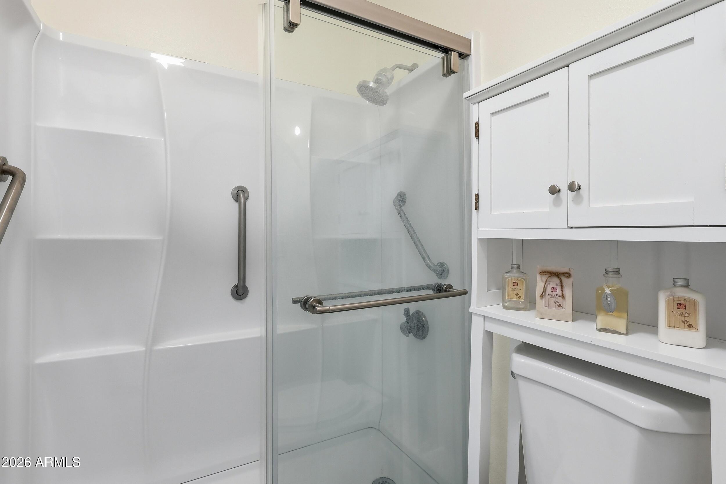 1825 West Ray Road, Unit 1018 Chandler, AZ 85224 - Photo 14 of 46 a bathroom with a shower and a sink