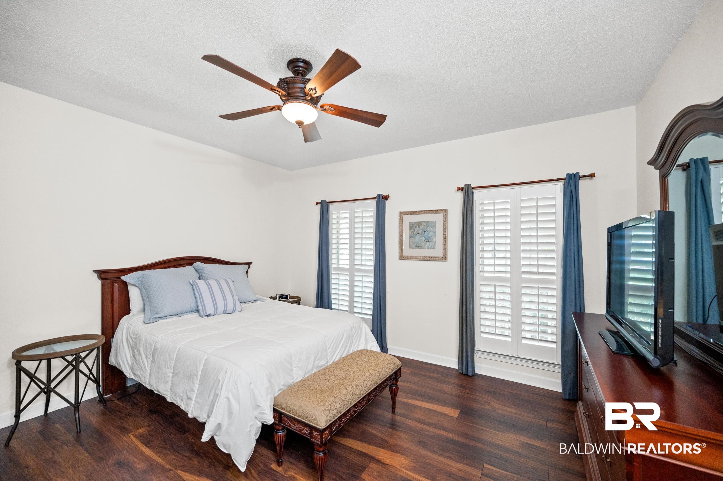 6638 Jackson Square Daphne, AL 36526 - Photo 22 of 62 Bedroom with dark wood-type flooring and ceiling fan