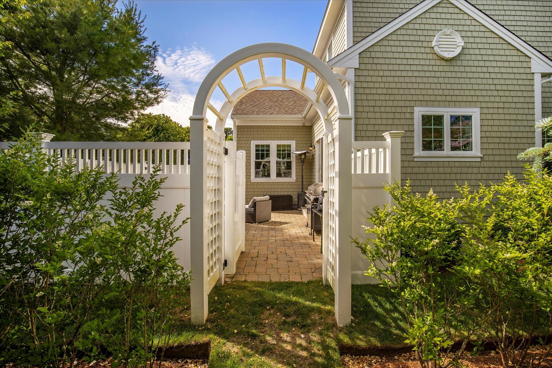 21 Saltwater Circle Mashpee, MA 02649 - Photo 25 of 40 a front view of a house with a porch