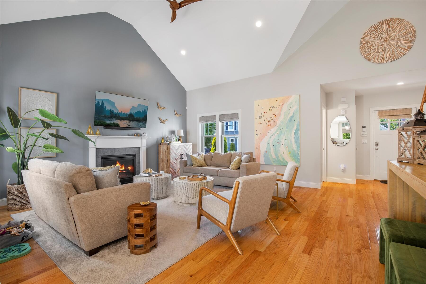 21 Saltwater Circle Mashpee, MA 02649 - Photo 3 of 40 a living room with fireplace furniture and a flat screen tv