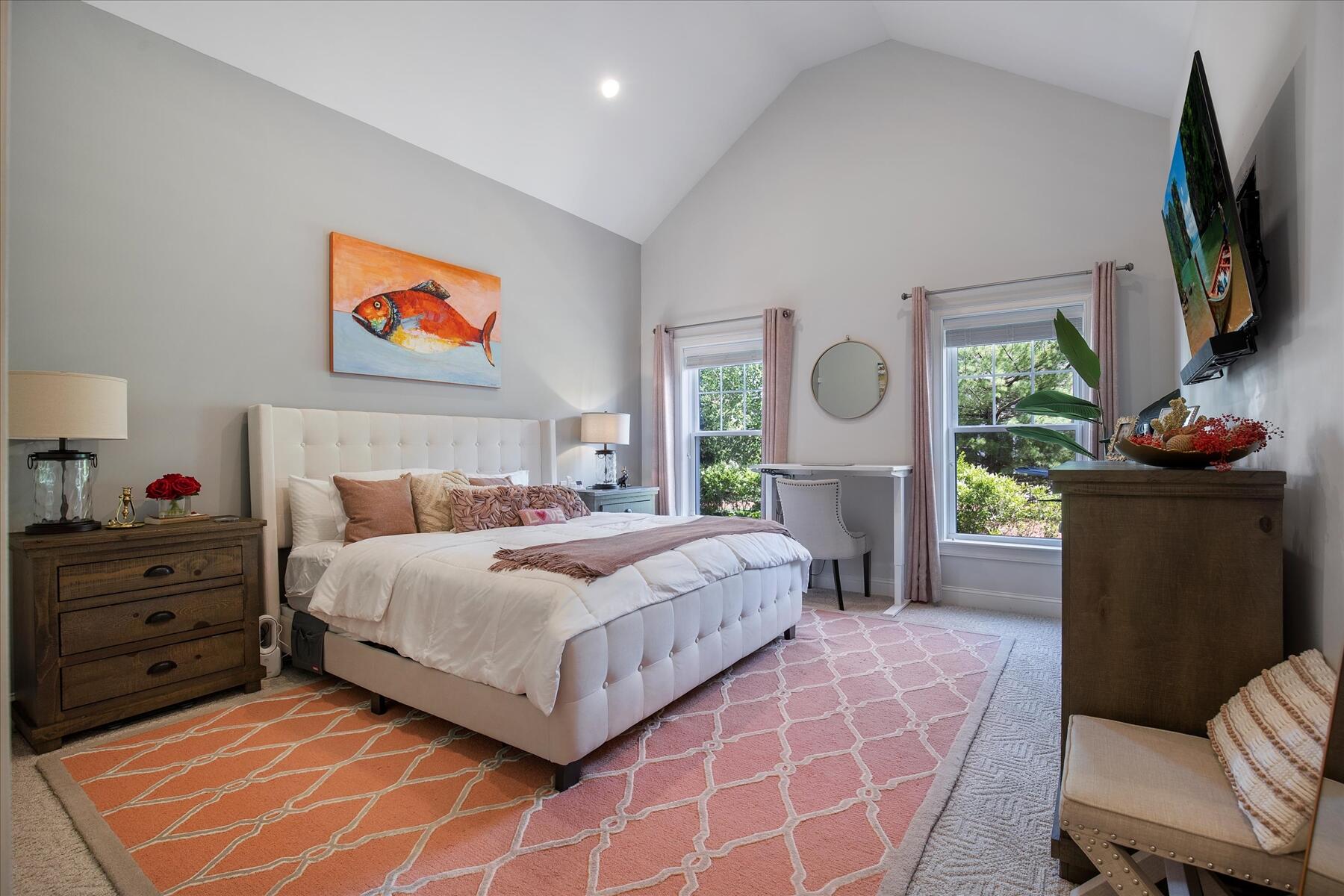 21 Saltwater Circle Mashpee, MA 02649 - Photo 7 of 40 a bedroom with a bed and a flat screen tv