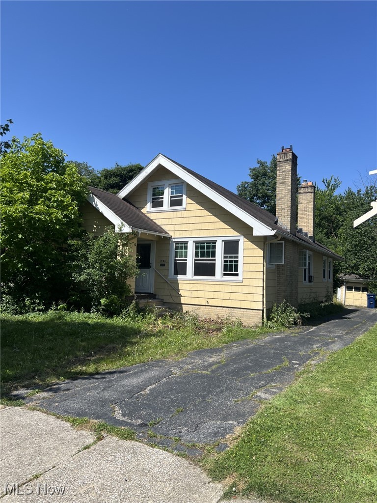 1486 Middleton Road Cleveland Heights, OH 44121 - Photo 1 of 9 View of front facade with a chimney