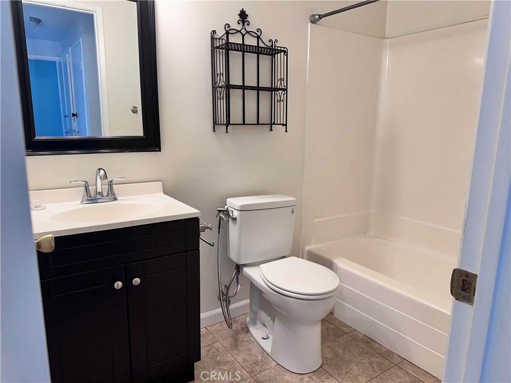 1 Sunflower Irvine, CA 92604 - Photo 15 of 19 a bathroom with a sink toilet and shower