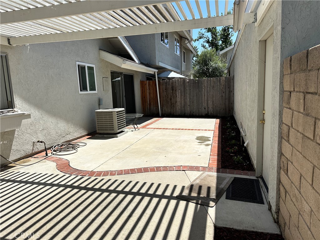 1 Sunflower Irvine, CA 92604 - Photo 17 of 19 a view of backyard with wooden floor and outdoor seating