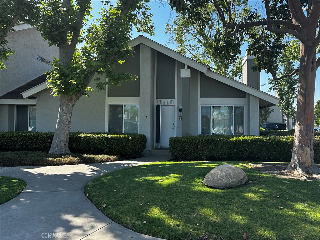 1 Sunflower Irvine, CA 92604 - Photo 2 of 19 a view of a house with a yard and a tree