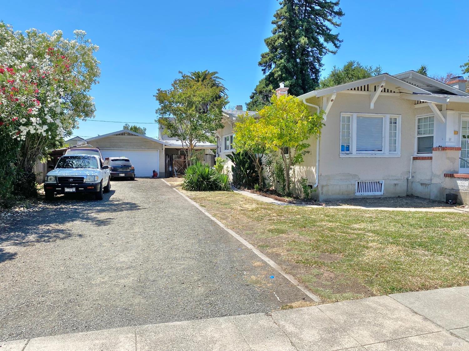 745 Jackson Street Fairfield, CA 94533 - Photo 16 of 72 a yellow house with trees in front of it