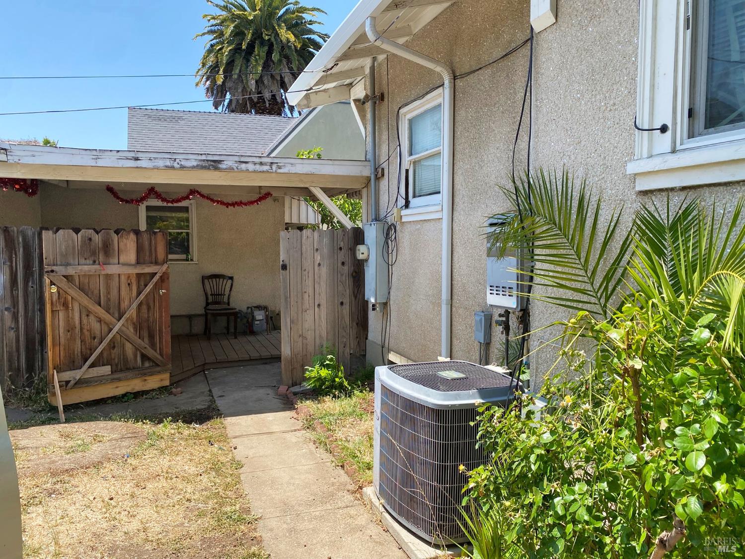 745 Jackson Street Fairfield, CA 94533 - Photo 18 of 72 a view of a house with potted plants