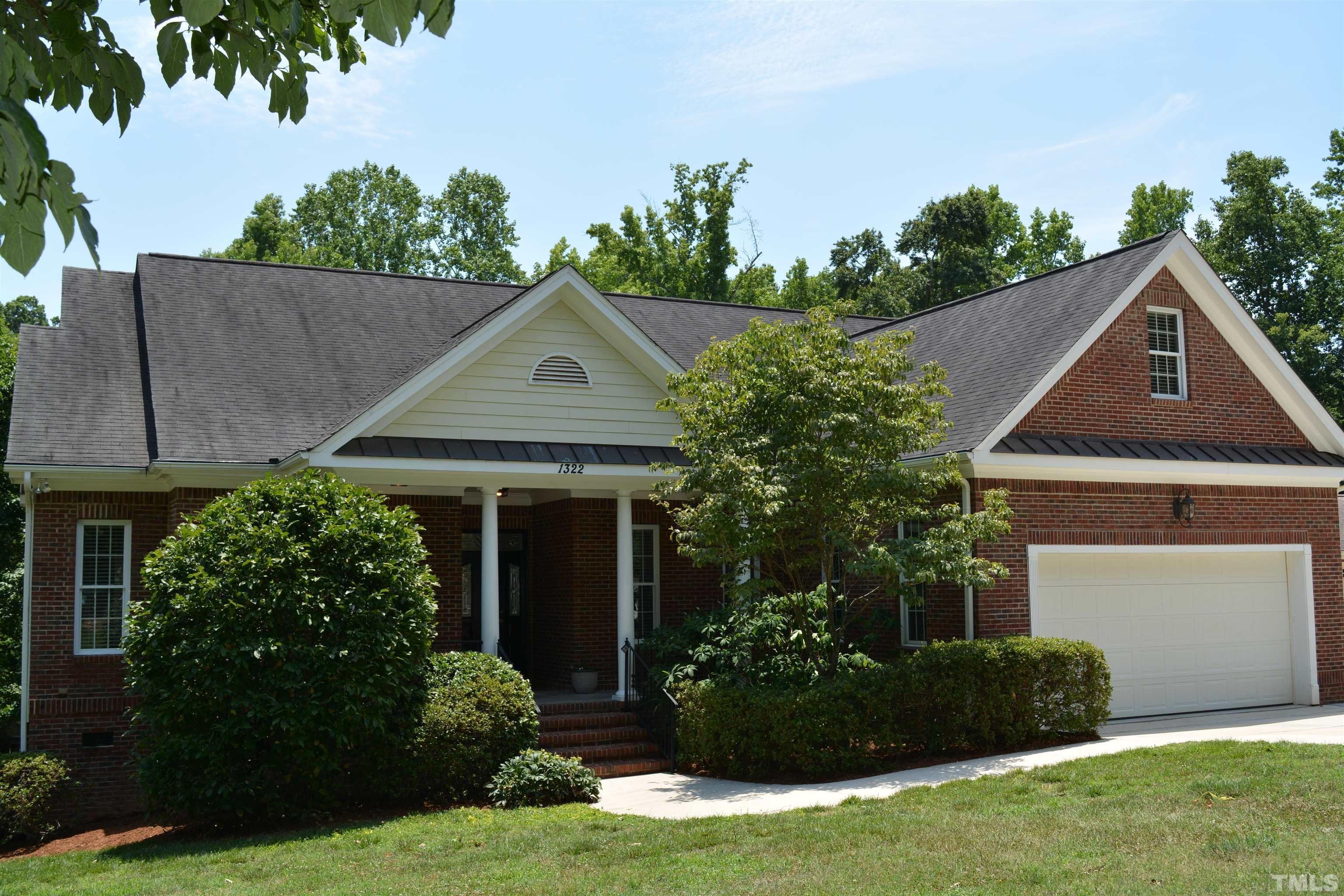 1322 Medfield Road Raleigh, NC 27607 - Photo 1 of 25 a front view of a house with a garden
