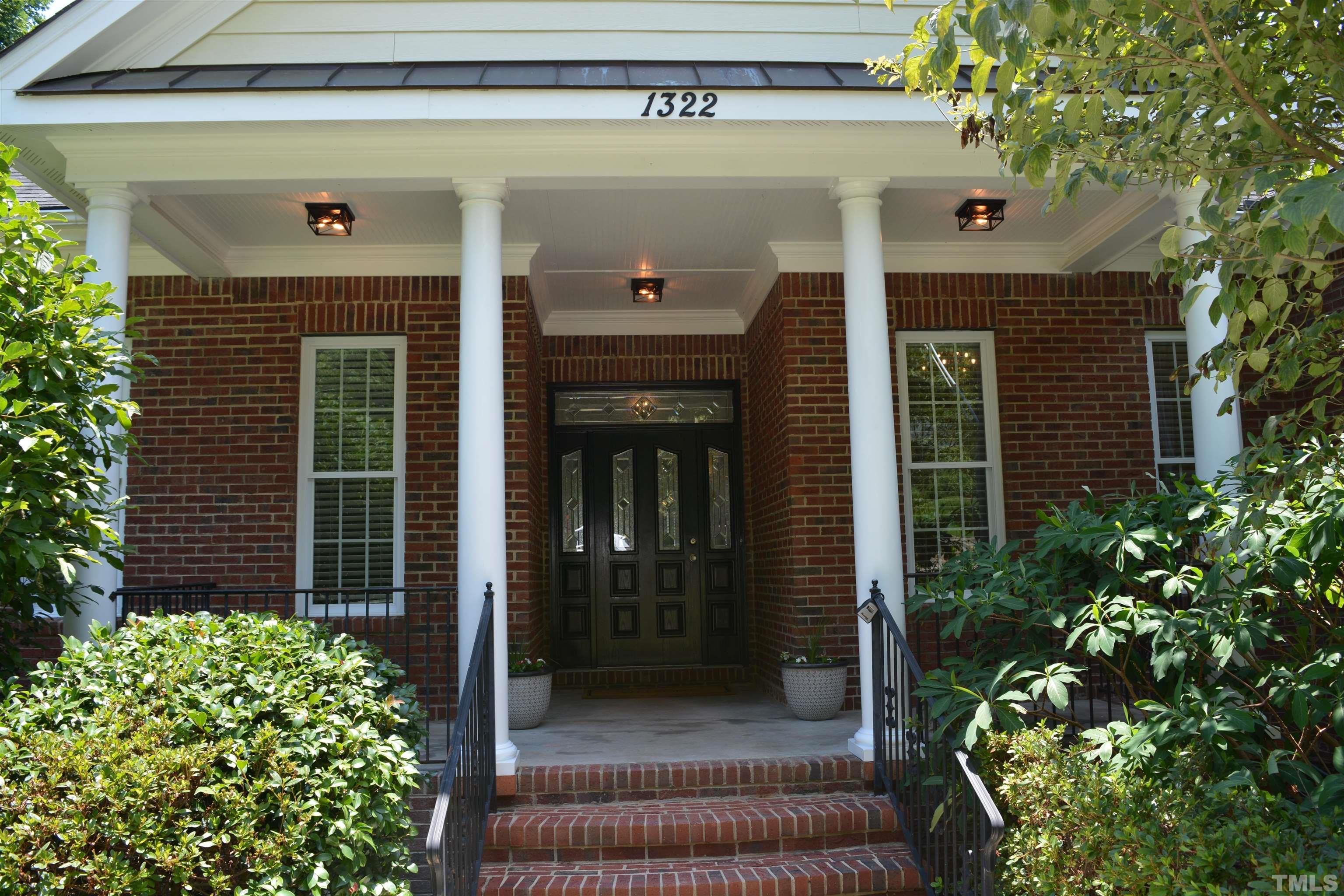 1322 Medfield Road Raleigh, NC 27607 - Photo 2 of 25 a front view of a house with garden