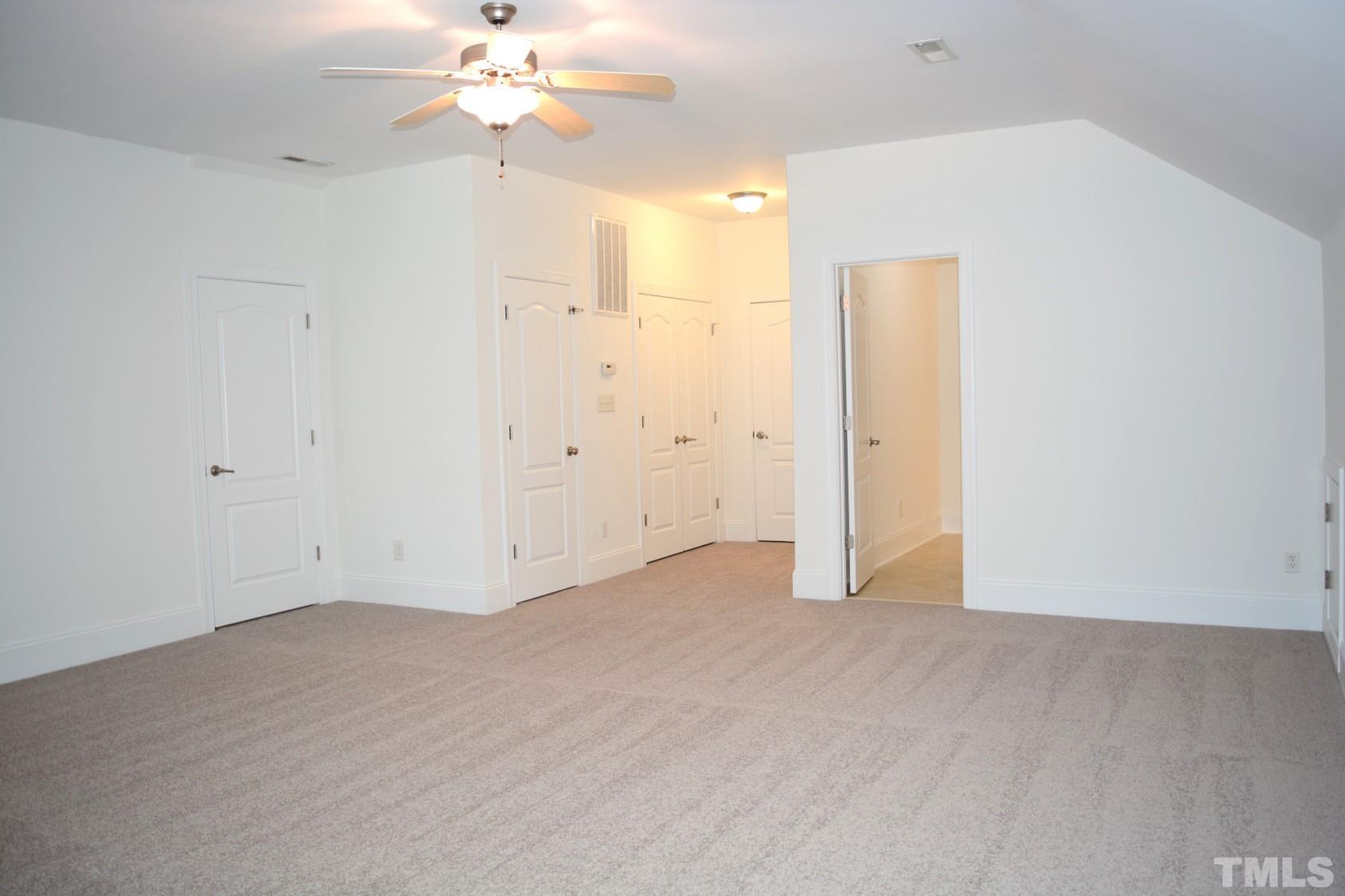 1322 Medfield Road Raleigh, NC 27607 - Photo 24 of 25 wooden floor in an empty room with a window