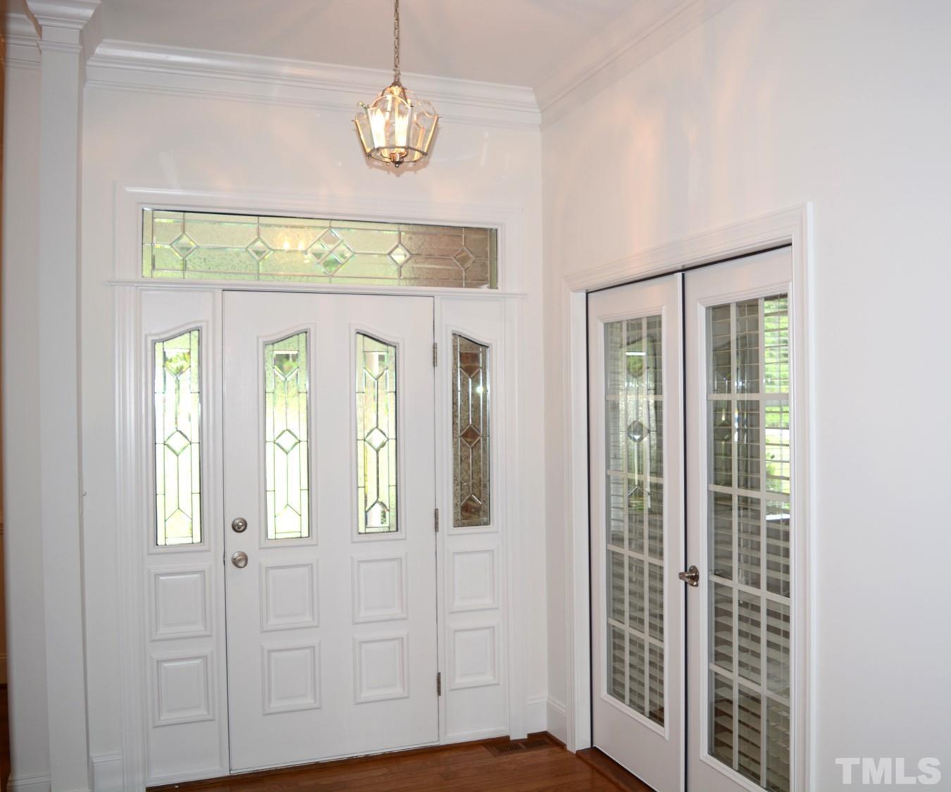 1322 Medfield Road Raleigh, NC 27607 - Photo 7 of 25 a view of an entryway with wooden floor