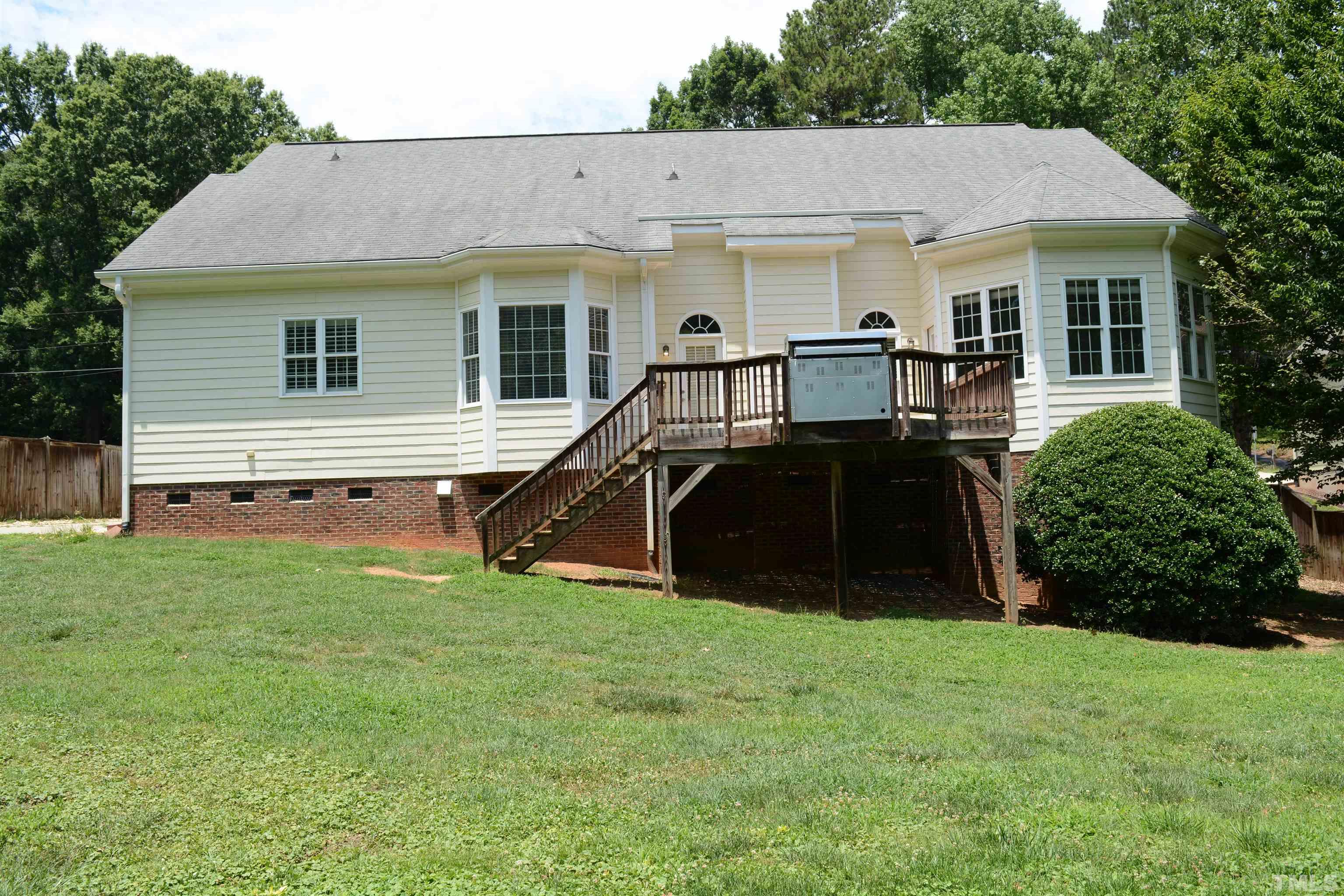1322 Medfield Road Raleigh, NC 27607 - Photo 10 of 25 a view of a house with a backyard