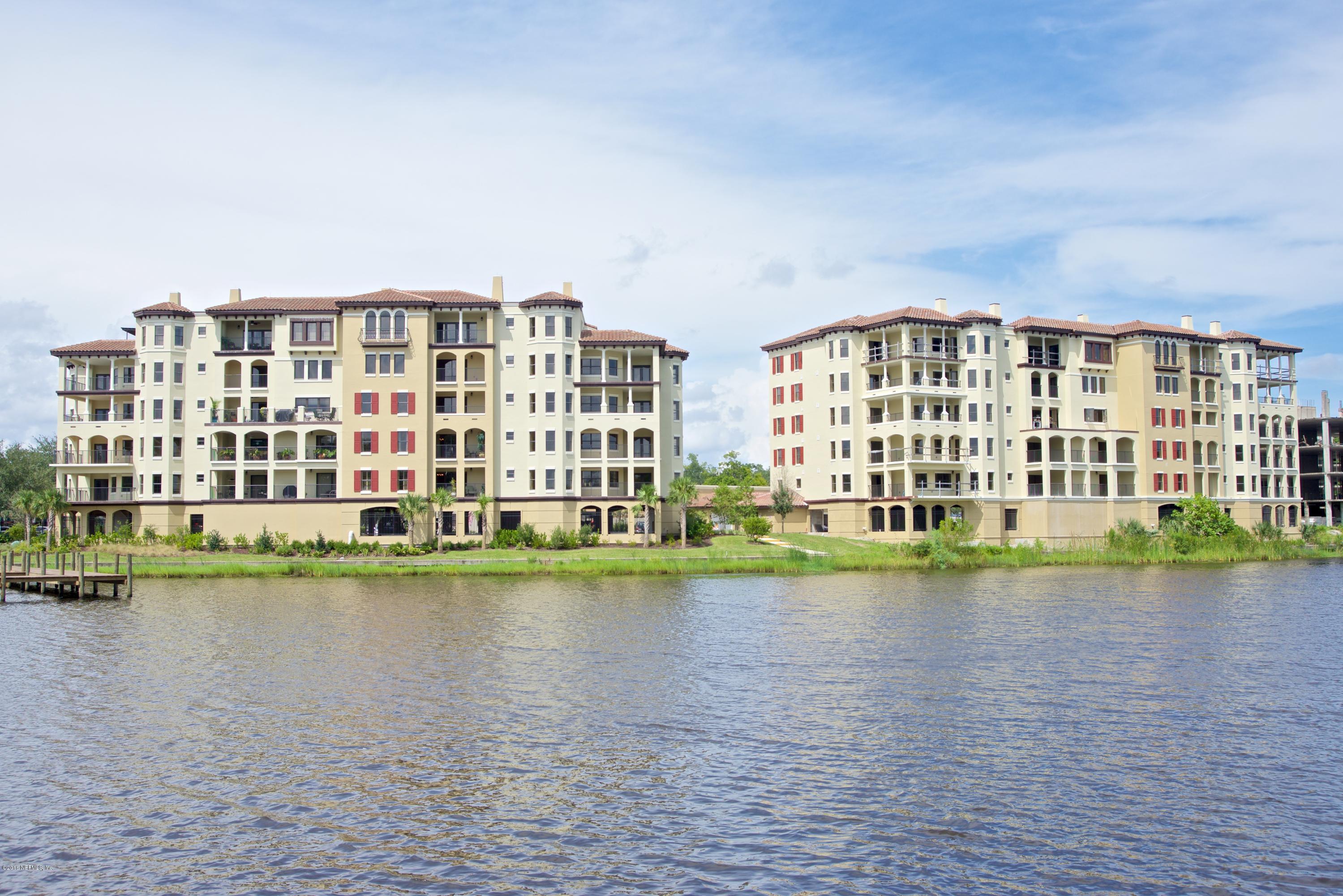 3958 Baymeadows Road, Unit 4402 Jacksonville, FL 32217 - Photo 2 of 14 a front view of a building with lake view