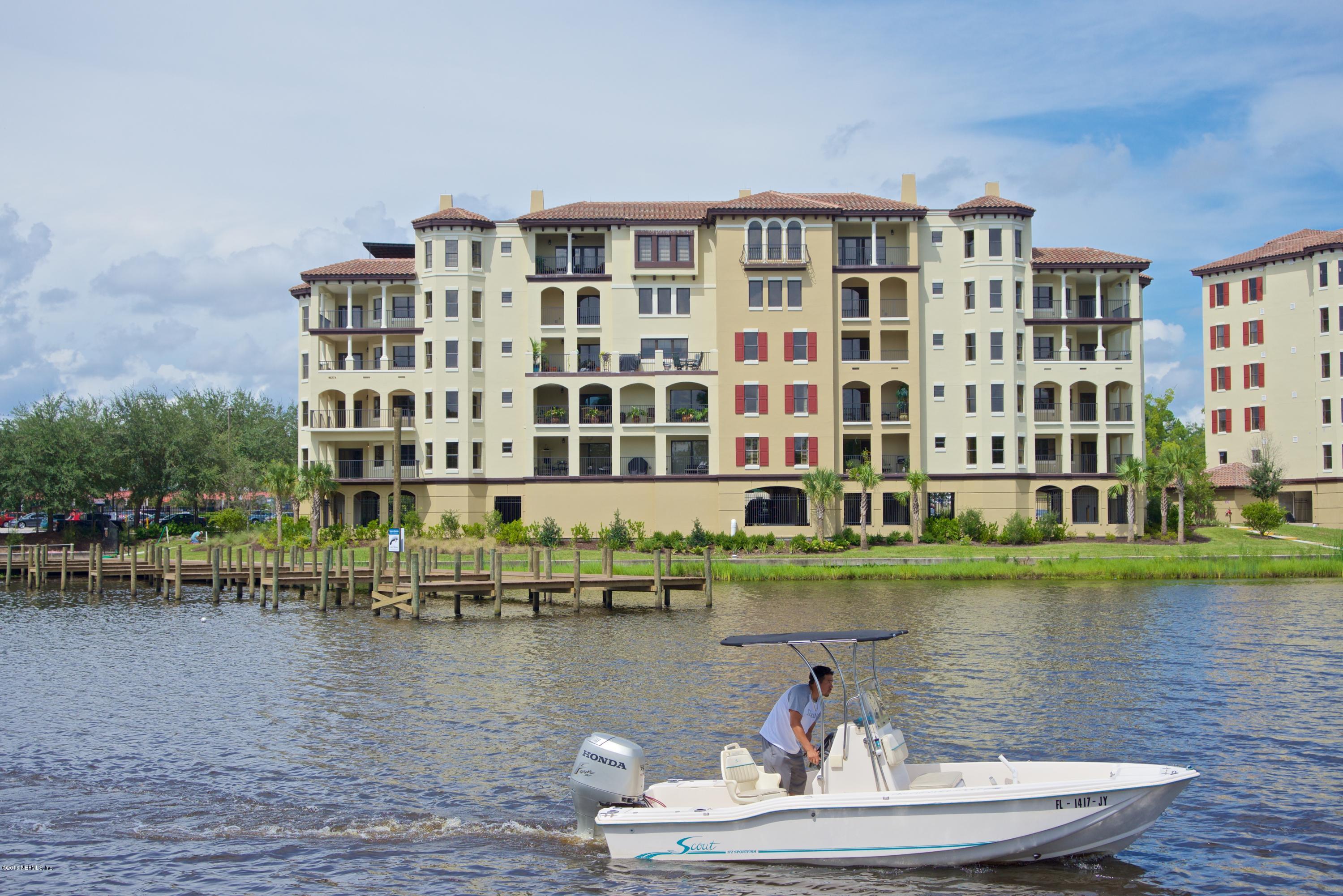 3958 Baymeadows Road, Unit 4402 Jacksonville, FL 32217 - Photo 3 of 14 a view of a lake with building and lake view