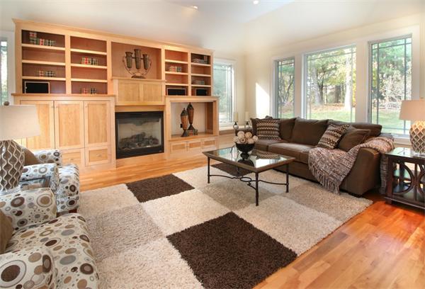 79 Winter Street Lincoln, MA 01773 - Photo 12 of 30 a living room with furniture window and a fireplace