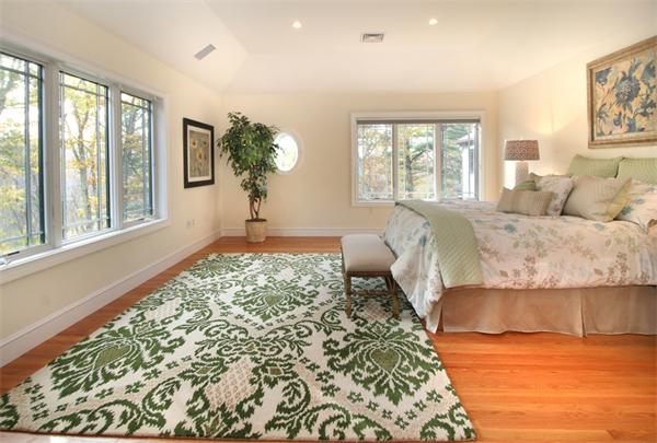 79 Winter Street Lincoln, MA 01773 - Photo 15 of 30 a bedroom with a large bed and a large window