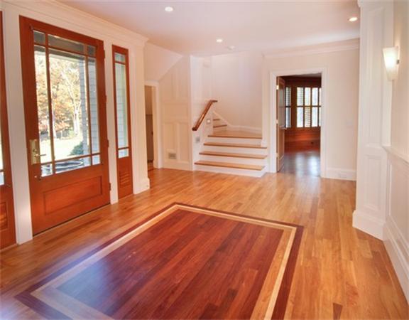 79 Winter Street Lincoln, MA 01773 - Photo 2 of 30 a view of an empty room with wooden floor and a window
