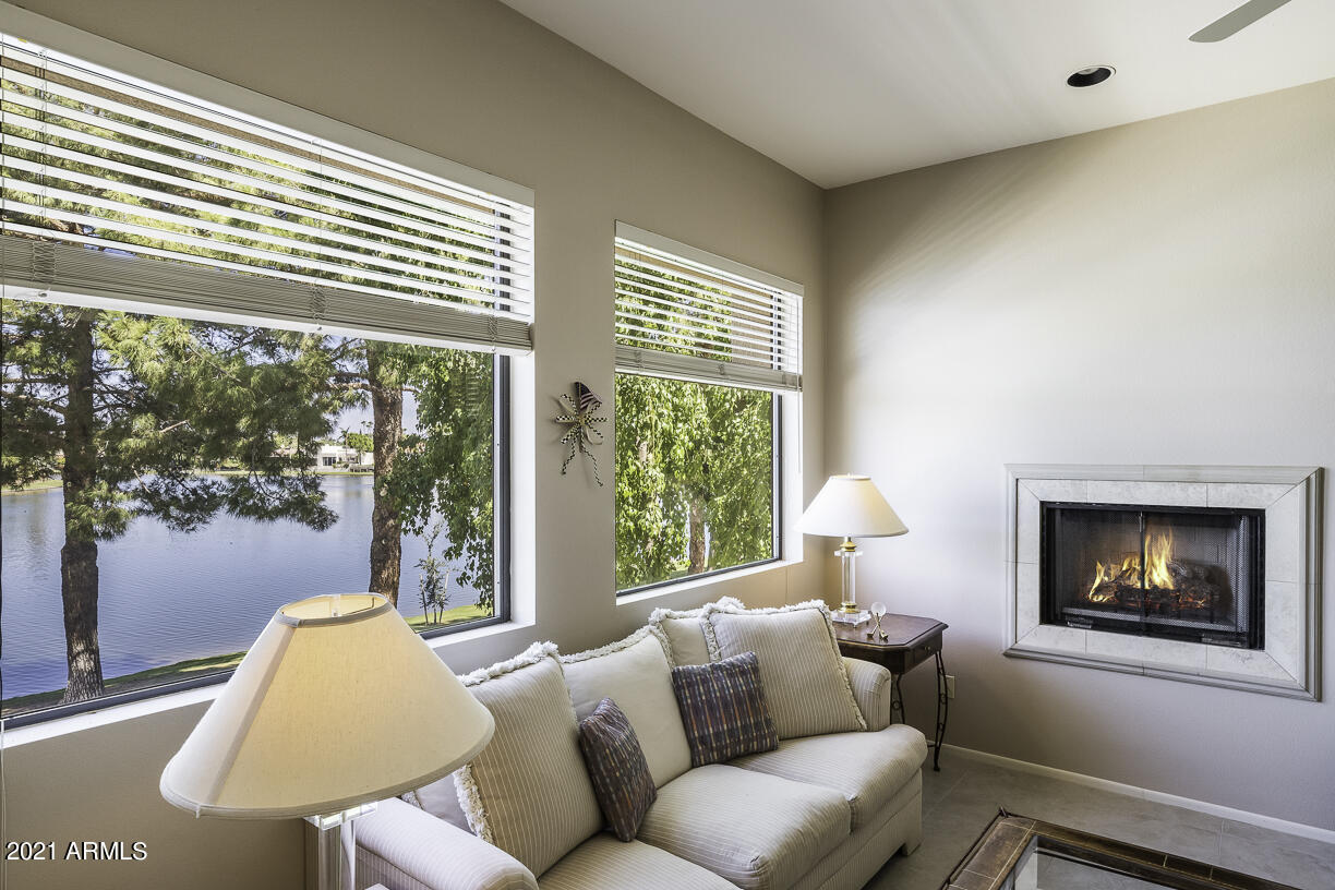 8270 North Hayden Road, Unit 2019 Scottsdale, AZ 85258 - Photo 13 of 39 a living room with furniture and a window