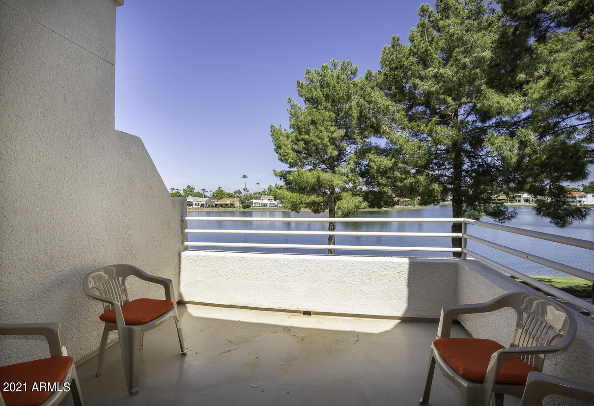8270 North Hayden Road, Unit 2019 Scottsdale, AZ 85258 - Photo 15 of 39 a view of a chair and table in the balcony