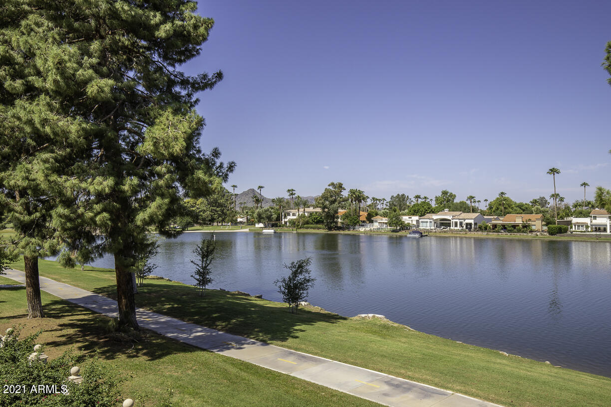 8270 North Hayden Road, Unit 2019 Scottsdale, AZ 85258 - Photo 31 of 39 a view of a lake with a house