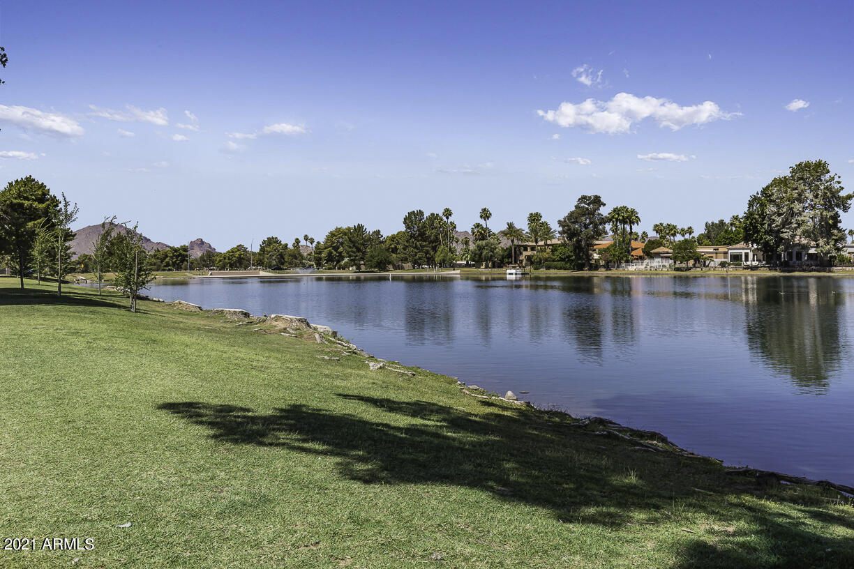 8270 North Hayden Road, Unit 2019 Scottsdale, AZ 85258 - Photo 36 of 39 a view of a lake with houses in the back