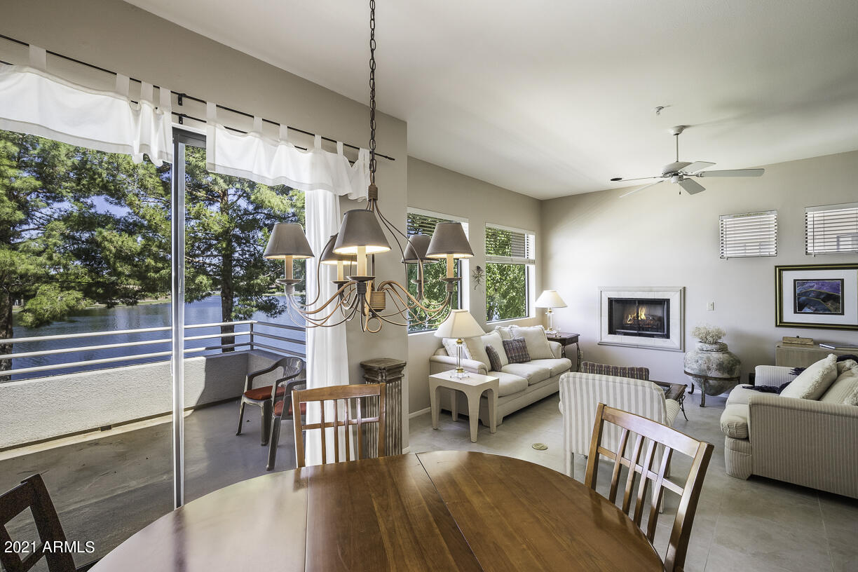 8270 North Hayden Road, Unit 2019 Scottsdale, AZ 85258 - Photo 5 of 39 a living room with furniture and a large window