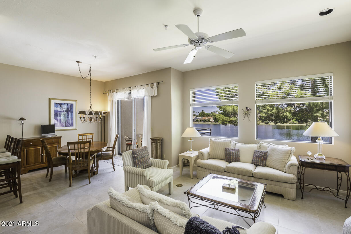 8270 North Hayden Road, Unit 2019 Scottsdale, AZ 85258 - Photo 6 of 39 a living room with furniture and a large window