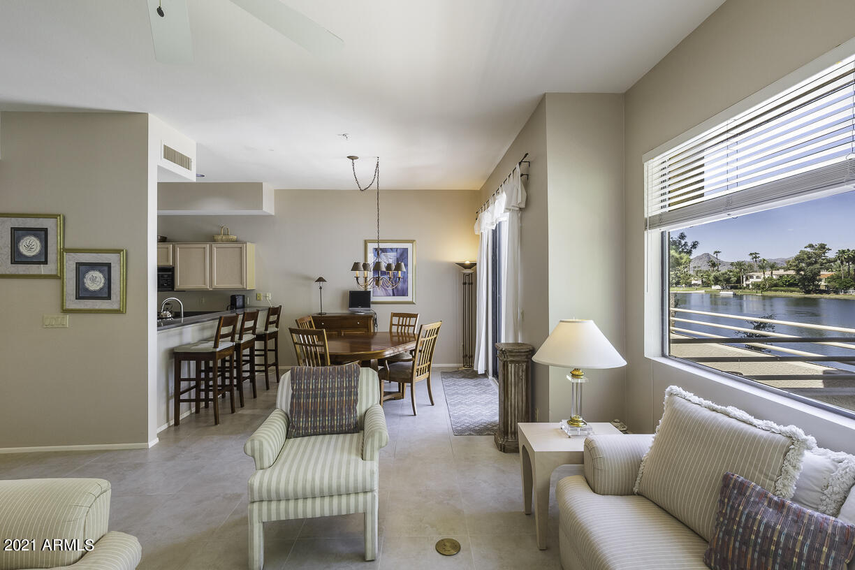 8270 North Hayden Road, Unit 2019 Scottsdale, AZ 85258 - Photo 7 of 39 a living room with furniture and a large window
