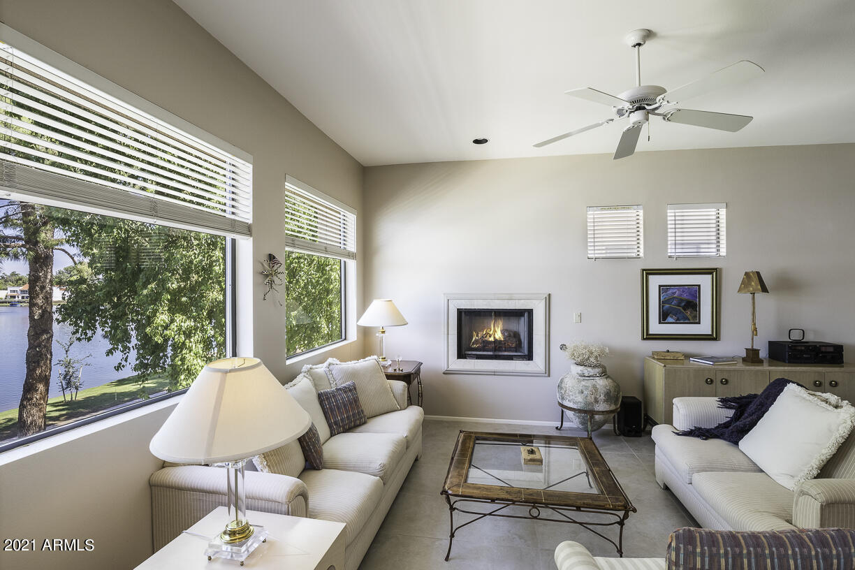 8270 North Hayden Road, Unit 2019 Scottsdale, AZ 85258 - Photo 10 of 39 a living room with furniture and a large window