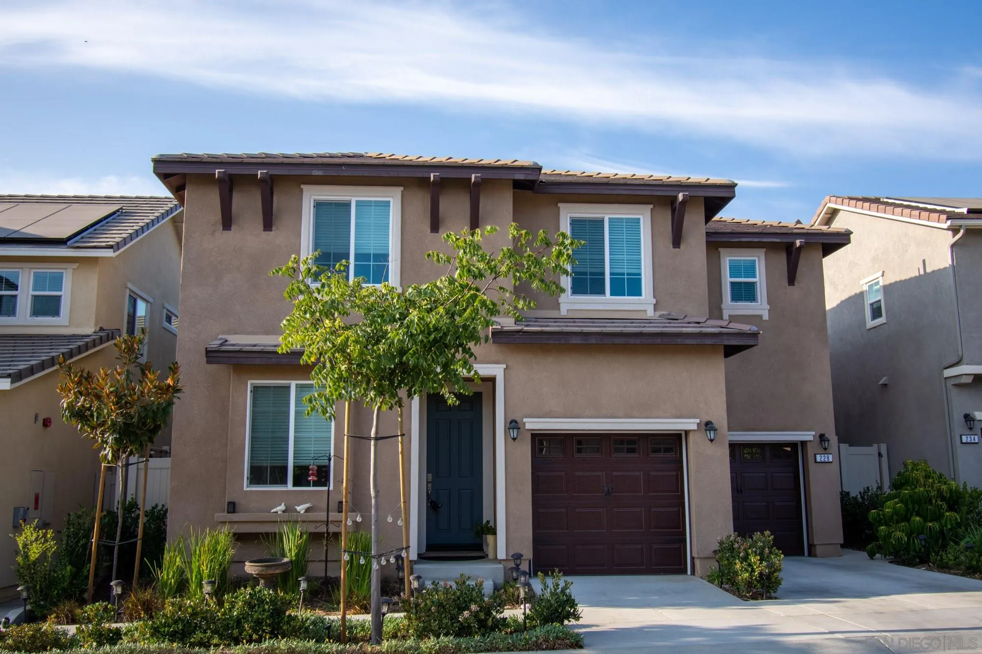 228 Oberlander Way Fallbrook, CA 92028 - Photo 1 of 23 front view of a house with potted plants