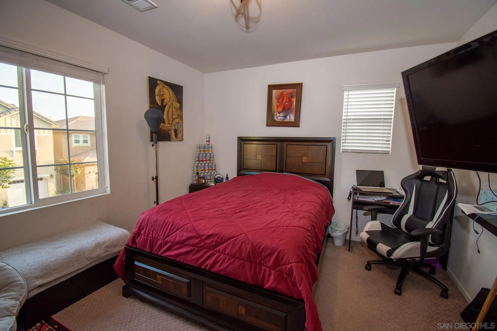 228 Oberlander Way Fallbrook, CA 92028 - Photo 14 of 23 a bed room with a bed window and a flat screen tv