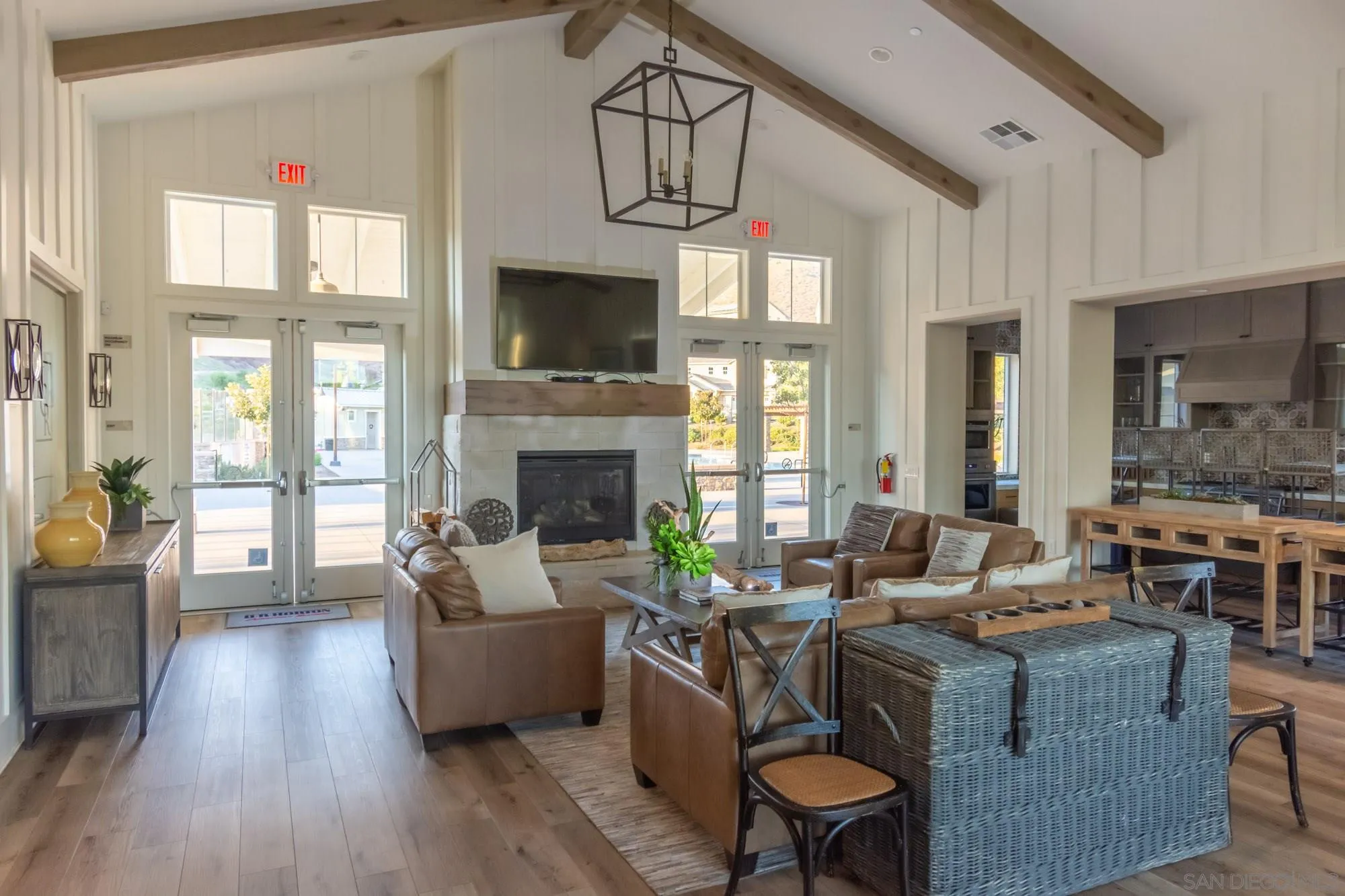 228 Oberlander Way Fallbrook, CA 92028 - Photo 21 of 23 a living room with furniture a fireplace and a flat screen tv