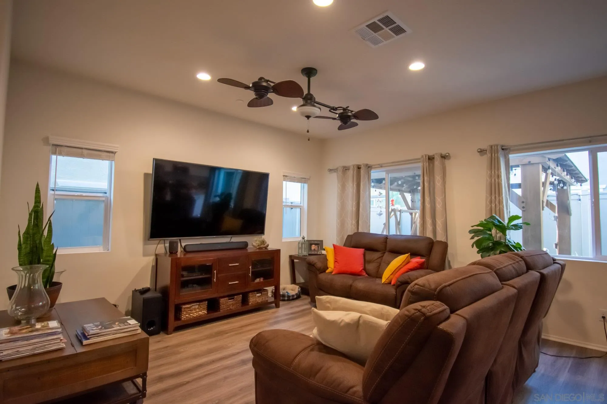 228 Oberlander Way Fallbrook, CA 92028 - Photo 7 of 23 a living room with furniture and a flat screen tv