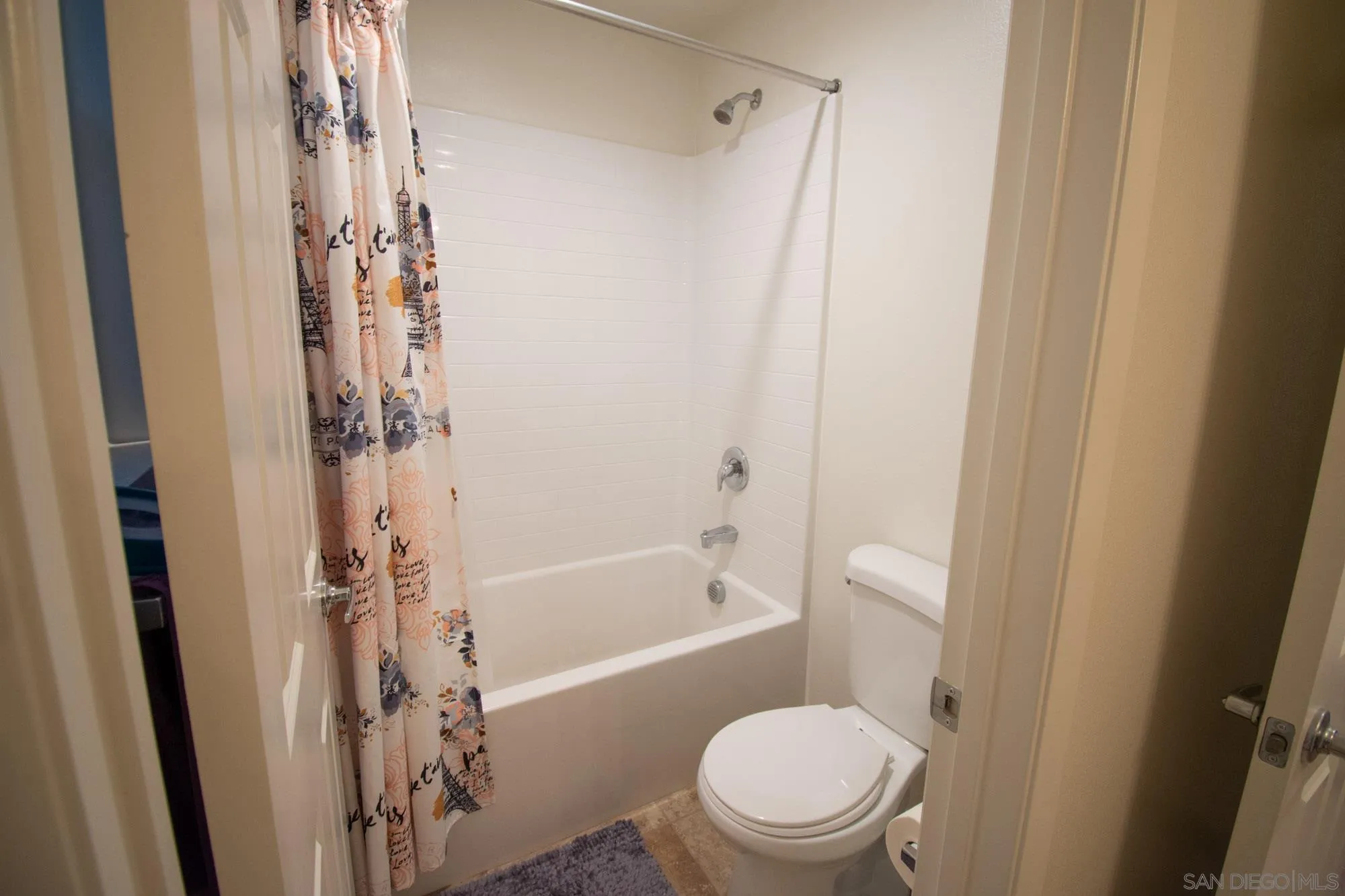 228 Oberlander Way Fallbrook, CA 92028 - Photo 9 of 23 a bathroom with a shower a toilet and a shower