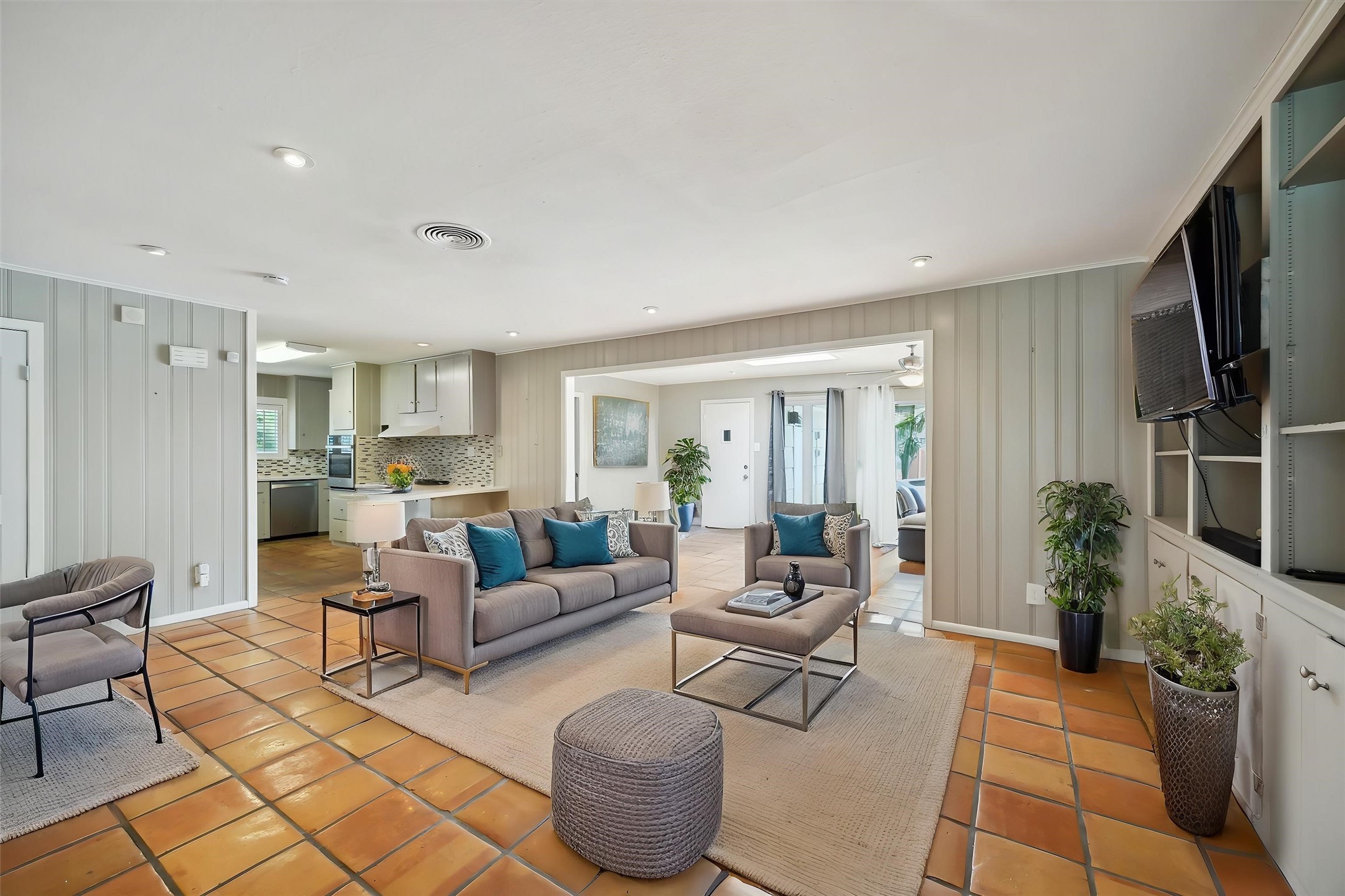 7222 Hartland Street Houston, TX 77055 - Photo 16 of 46 a living room with furniture and a flat screen tv
