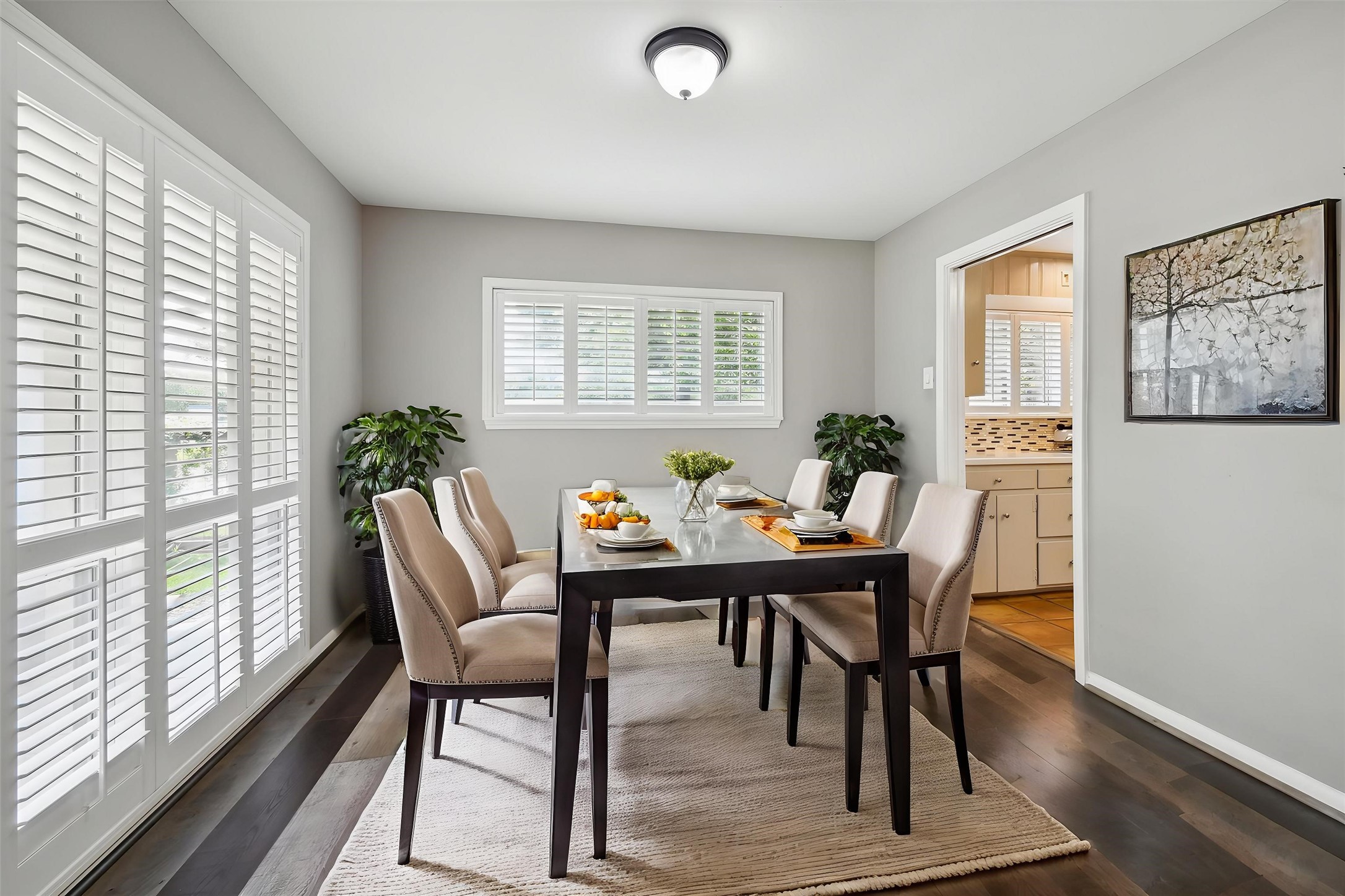 7222 Hartland Street Houston, TX 77055 - Photo 10 of 46 a view of a dining room with furniture window and wooden floor