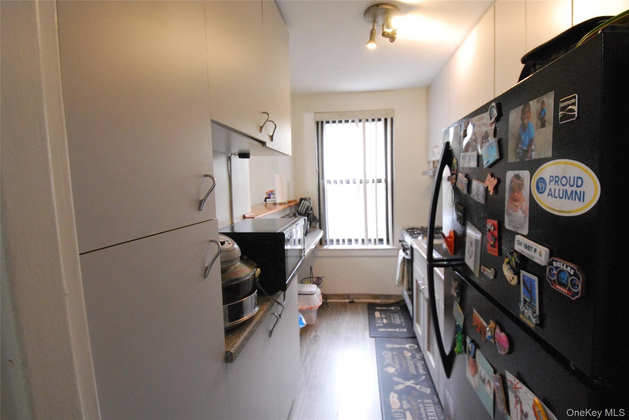 106 Richbell Road, Unit B2 Mamaroneck, NY 10543 - Photo 4 of 16 a view of a hallway with workspace and a window