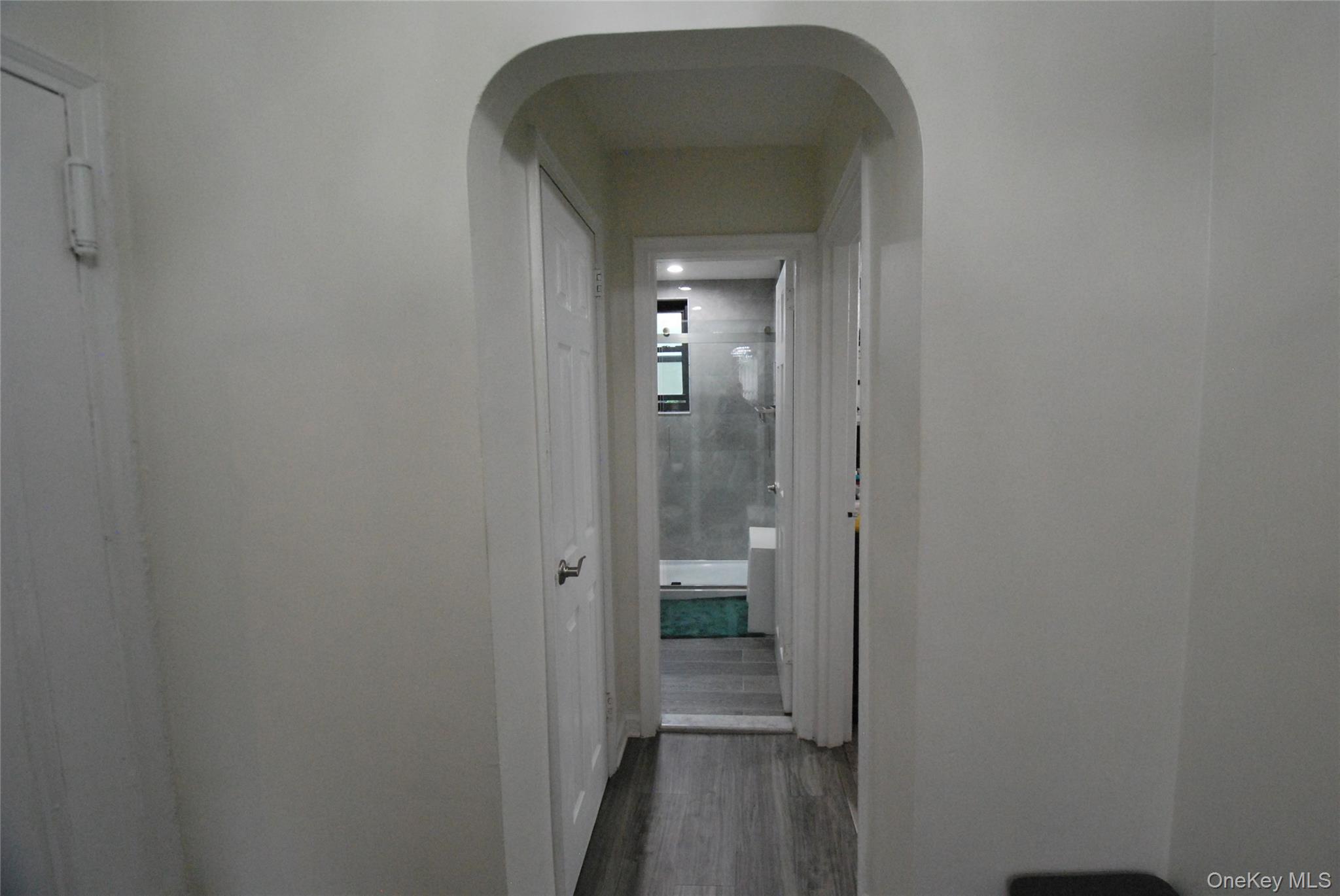 106 Richbell Road, Unit B2 Mamaroneck, NY 10543 - Photo 6 of 16 a view of a bathroom from a hallway