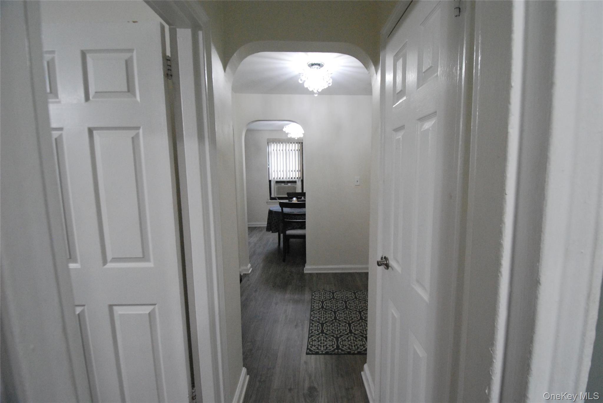 106 Richbell Road, Unit B2 Mamaroneck, NY 10543 - Photo 10 of 16 a view of a livingroom from a hallway
