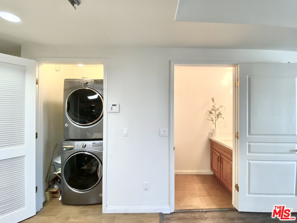 11 South 3rd Street, Unit 502 Alhambra, CA 91801 - Photo 25 of 33 a view of a hallway with washer and dryer