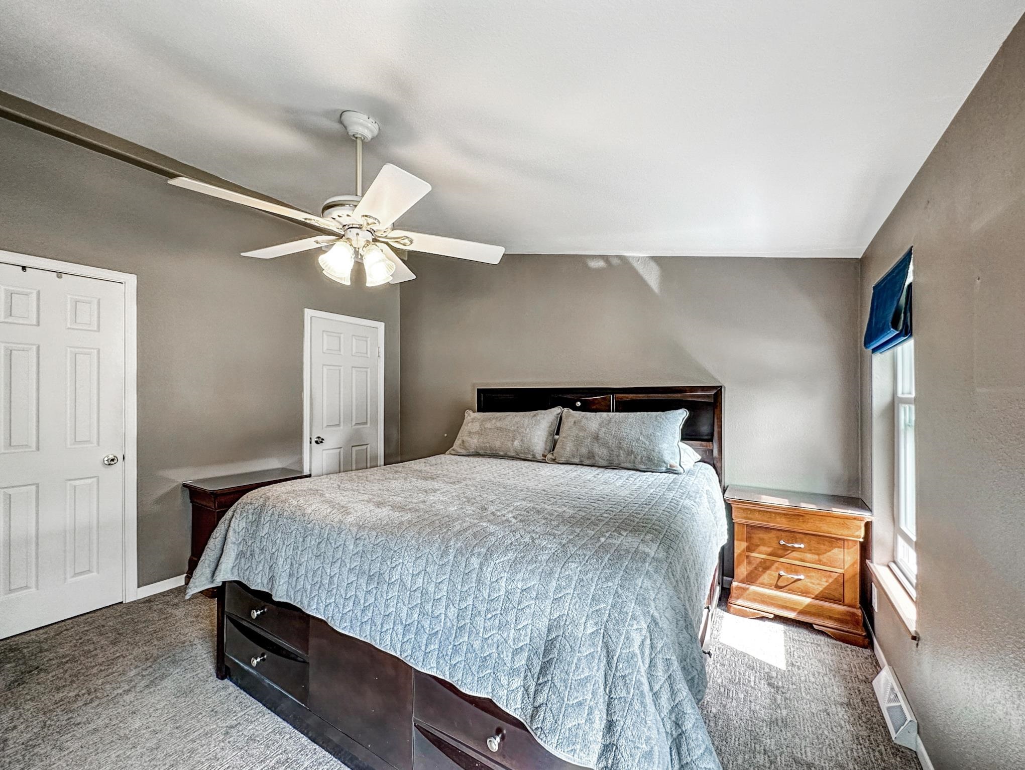 29501 P P 50 Road Hotchkiss, CO 81419 - Photo 17 of 33 a bedroom with a bed and a chandelier