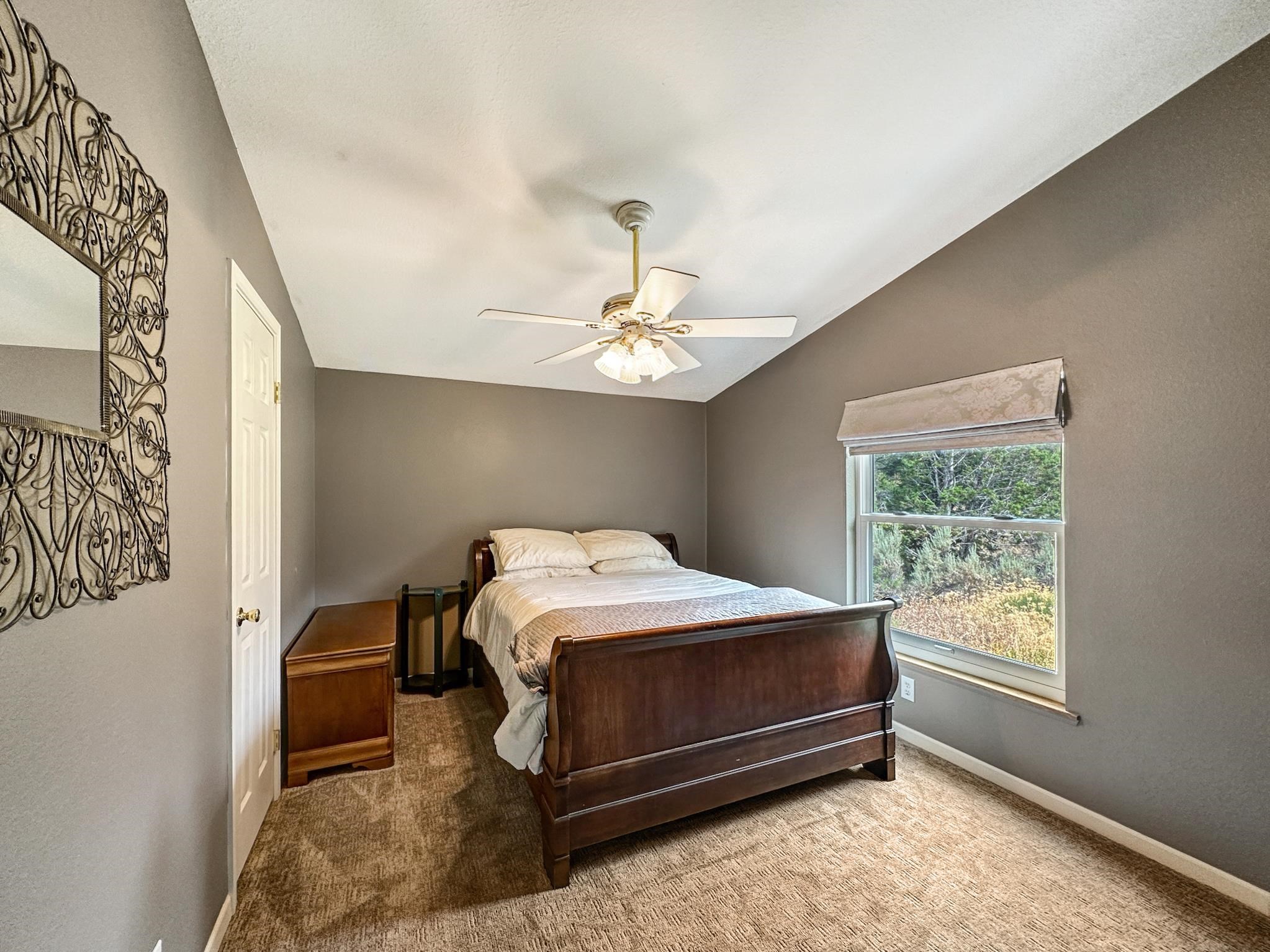 29501 P P 50 Road Hotchkiss, CO 81419 - Photo 18 of 33 a bed sitting in a bedroom next to a window