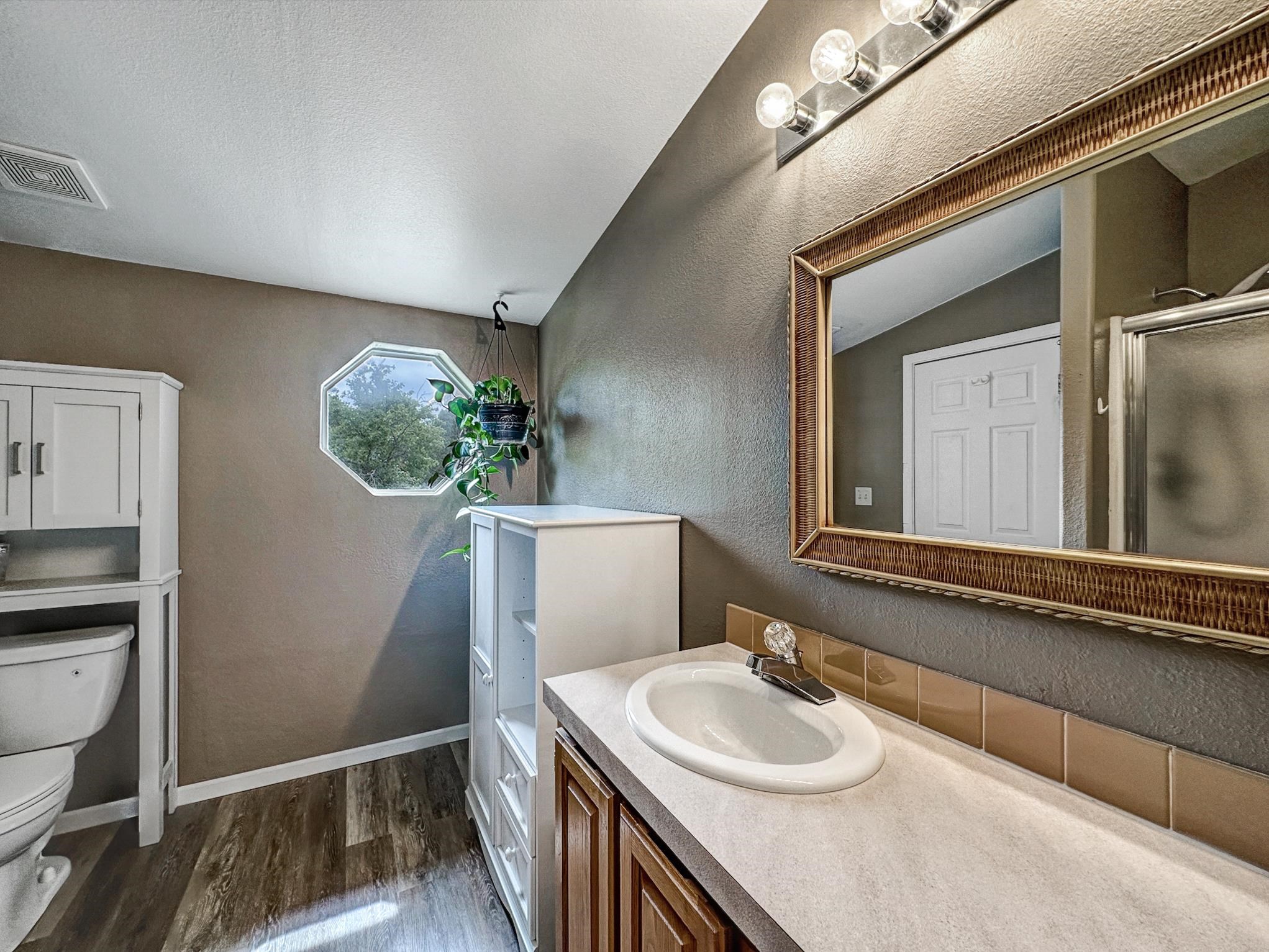 29501 P P 50 Road Hotchkiss, CO 81419 - Photo 21 of 33 a bathroom with a sink and a mirror