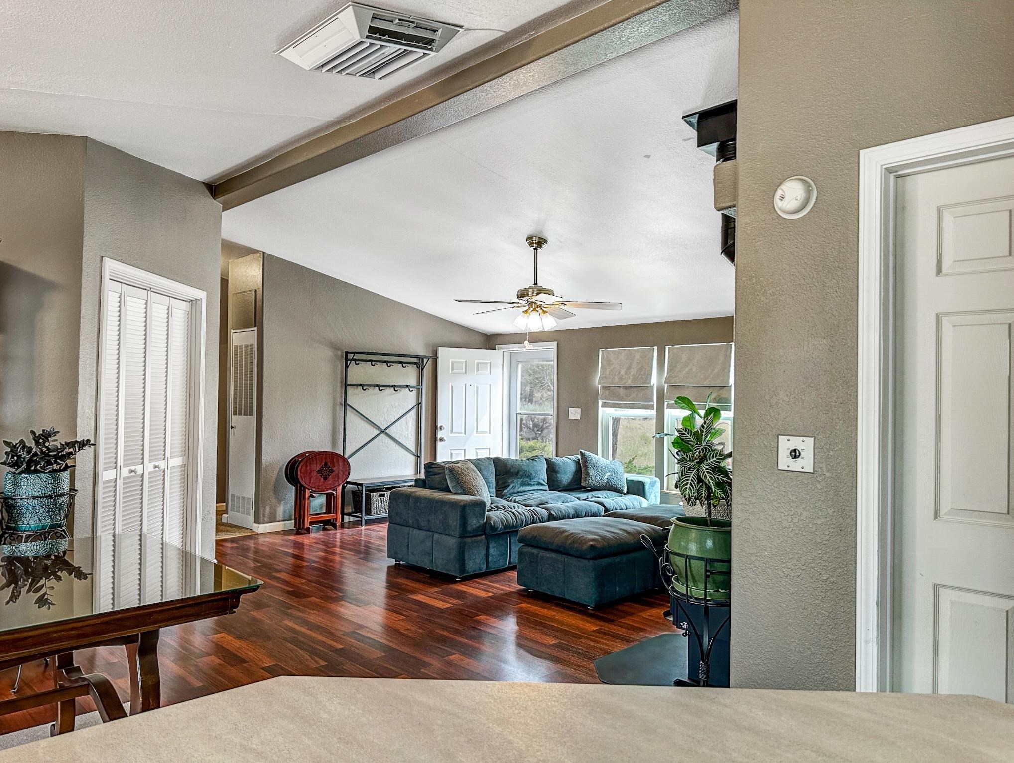 29501 P P 50 Road Hotchkiss, CO 81419 - Photo 9 of 33 a living room with furniture and a large window