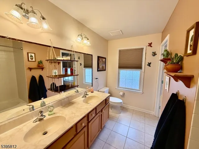 a bathroom with a shower and a bath tub