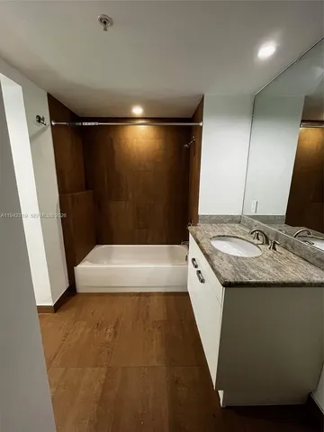 a bathroom with a sink and a toilet