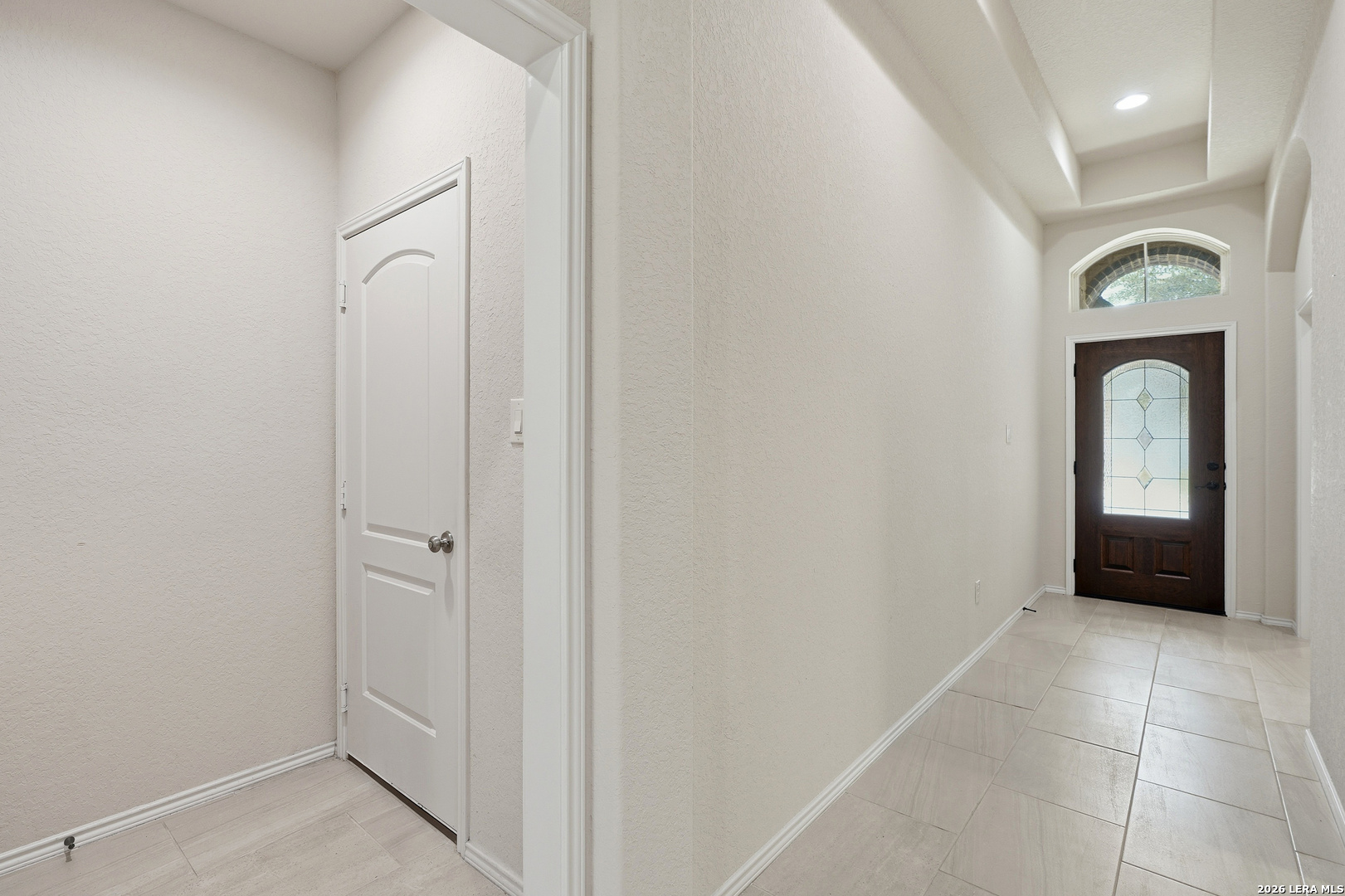 2129 Range Road Seguin, TX 78155 - Photo 6 of 41 an entryway with a door and a mirror