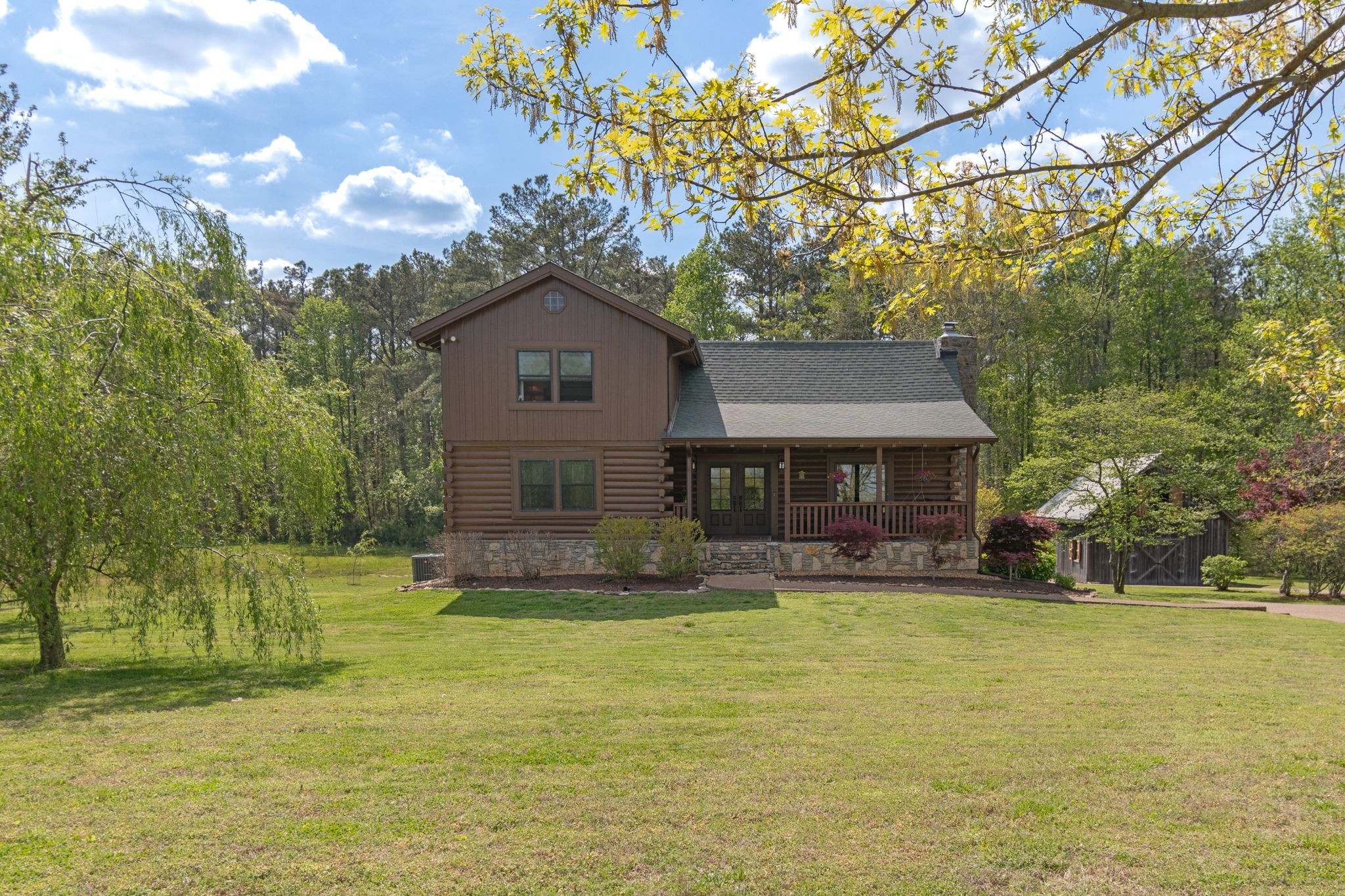 5609 Bending Chestnut Road Franklin, TN 37064 - Photo 1 of 24 a front view of a house with a yard