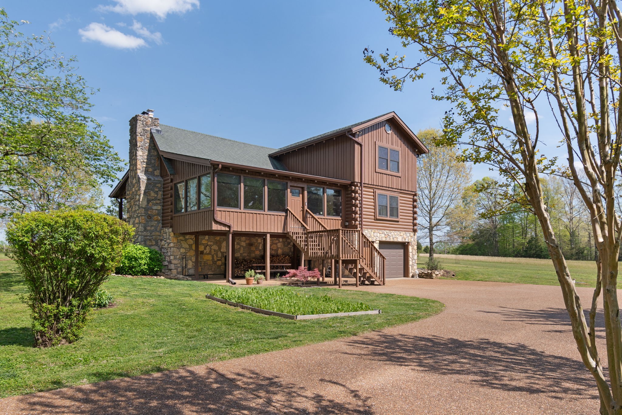 5609 Bending Chestnut Road Franklin, TN 37064 - Photo 4 of 24 a front view of a house with garden
